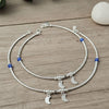 Silver Anklet with Blue Beads and Moon Motifs