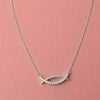 “Elegant Curve Necklace with Cubic Zirconia Detailing”