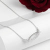 “Elegant Curve Necklace with Cubic Zirconia Detailing”