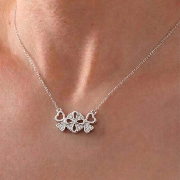 “Sparkling Hearts & Flower Pendant Necklace – Elegant Silver-Tone Charm”