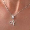 Delicate Tulip with Twin Hearts Pendant