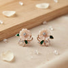 kolrt - Elegant White Flower Earrings with Green Leaf Detailing