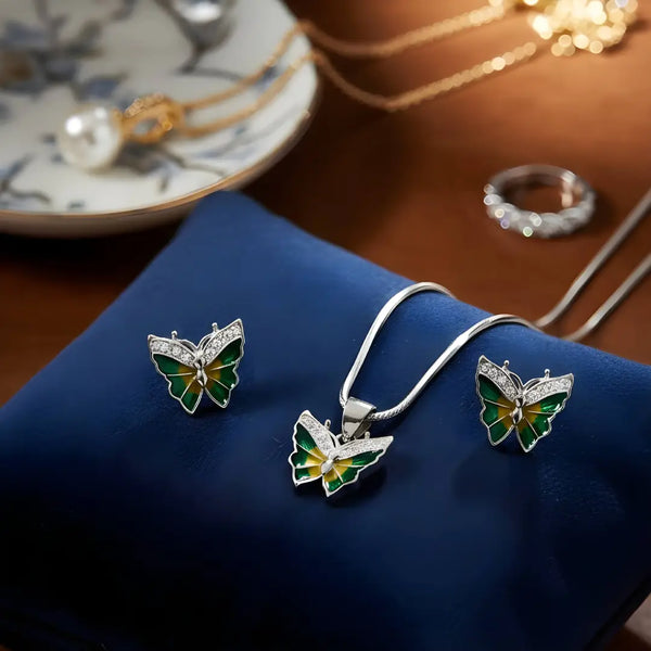 Elegant Silver Butterfly Pendant with Green Enamel Earrings Set